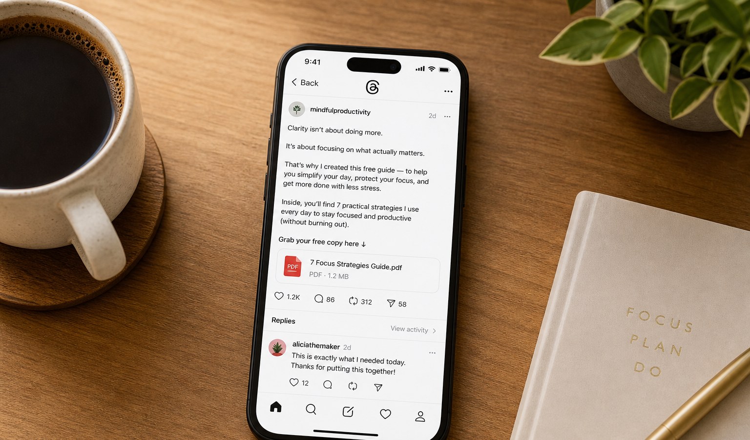 Smartphone displaying Threads app with a PDF product link on a minimalist desk setup